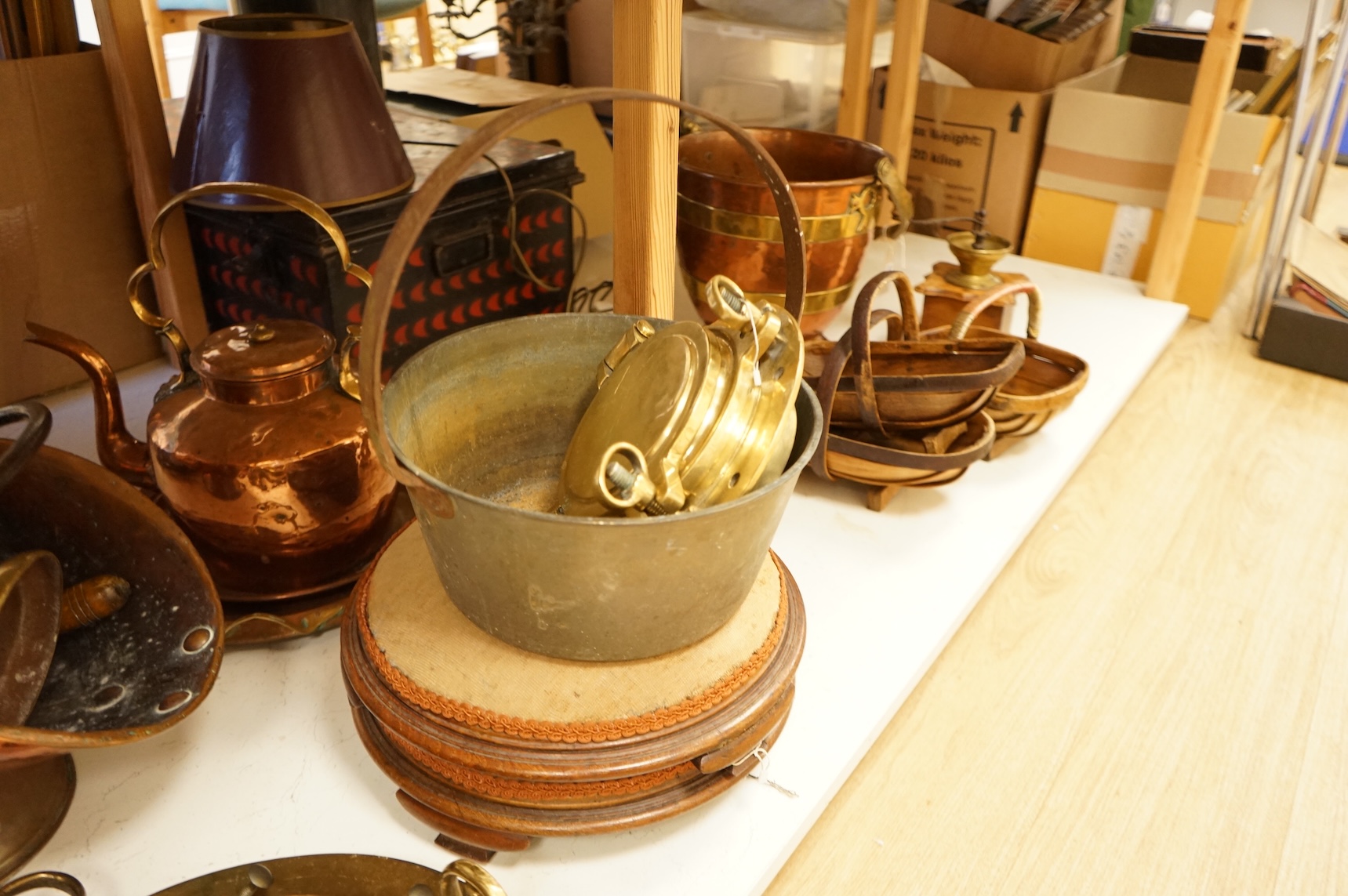 Assorted Victorian and later copper and brassware including two ships portholes, copper kettle pots, etc (16). Large porthole 36cm diameter